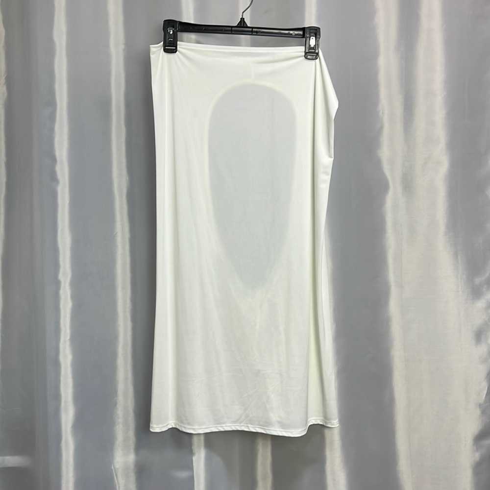 Einim white backless, sleeveless sexy dress.  New but no tags